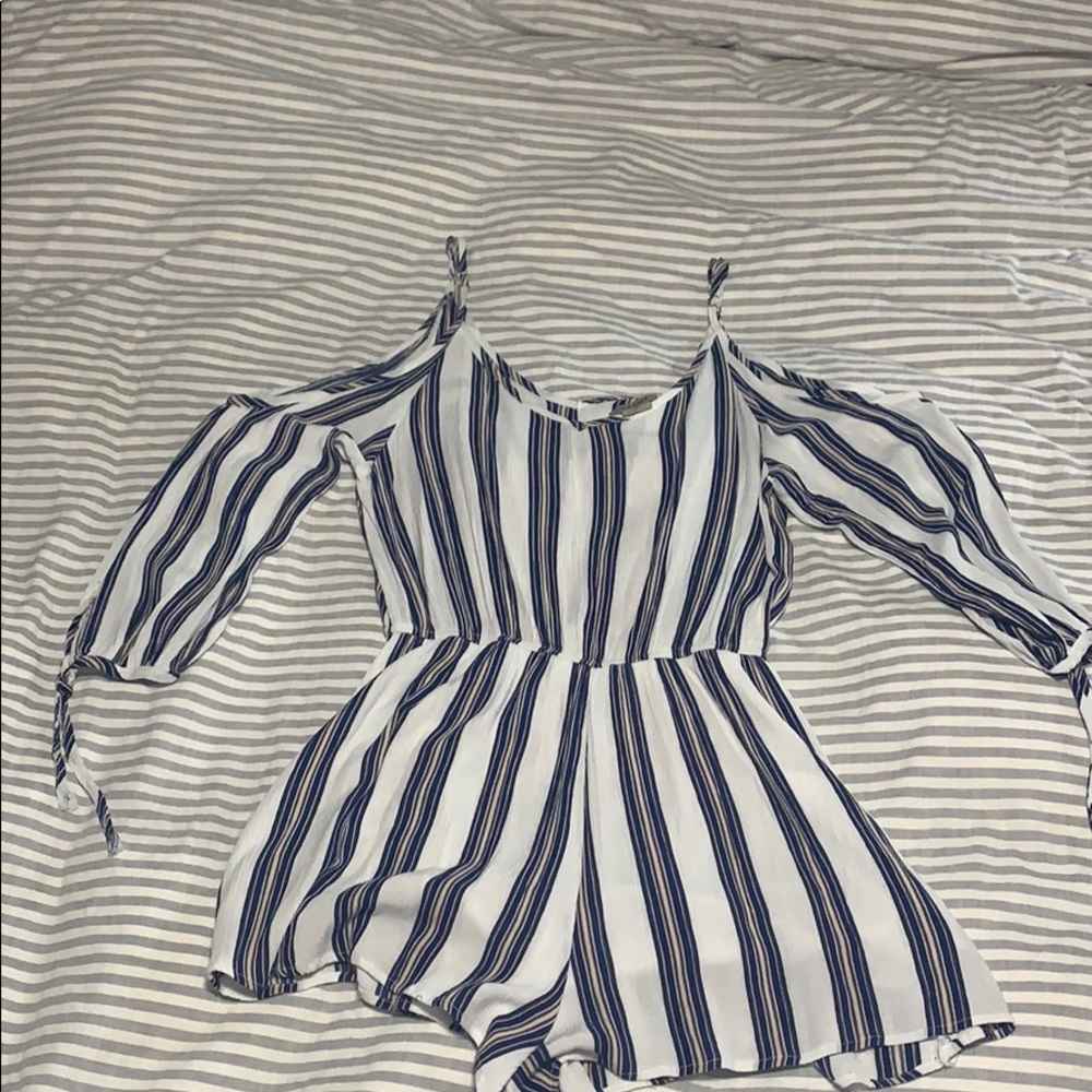 Anama Romper with shoulder cut outs.